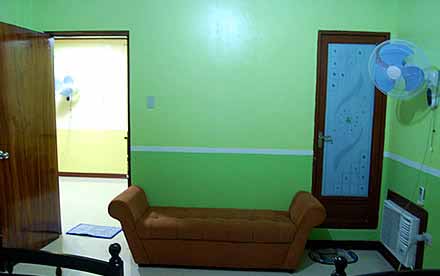Couch, Aircon, Electric Fan & Rest Room inside the Room (2nd Floor)