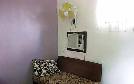 Couch, Aircon and Electric Fan
